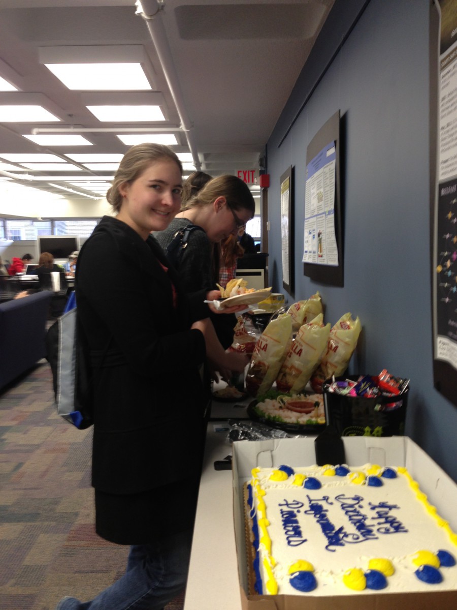 Students in line for cake.